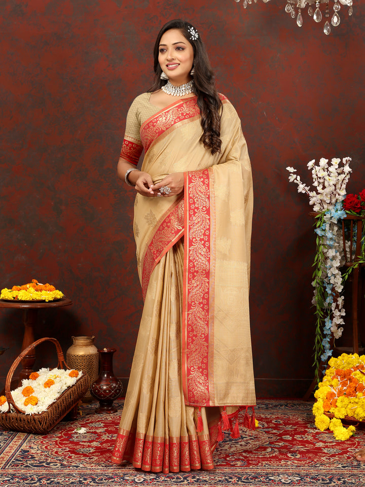 Elegant beige cotton saree with zari pallu and silk blouse piece, ideal for traditional occasions.