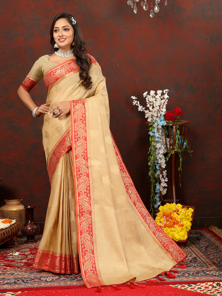 Beige cotton saree featuring luxurious zari pallu, perfect for Indian celebrations.