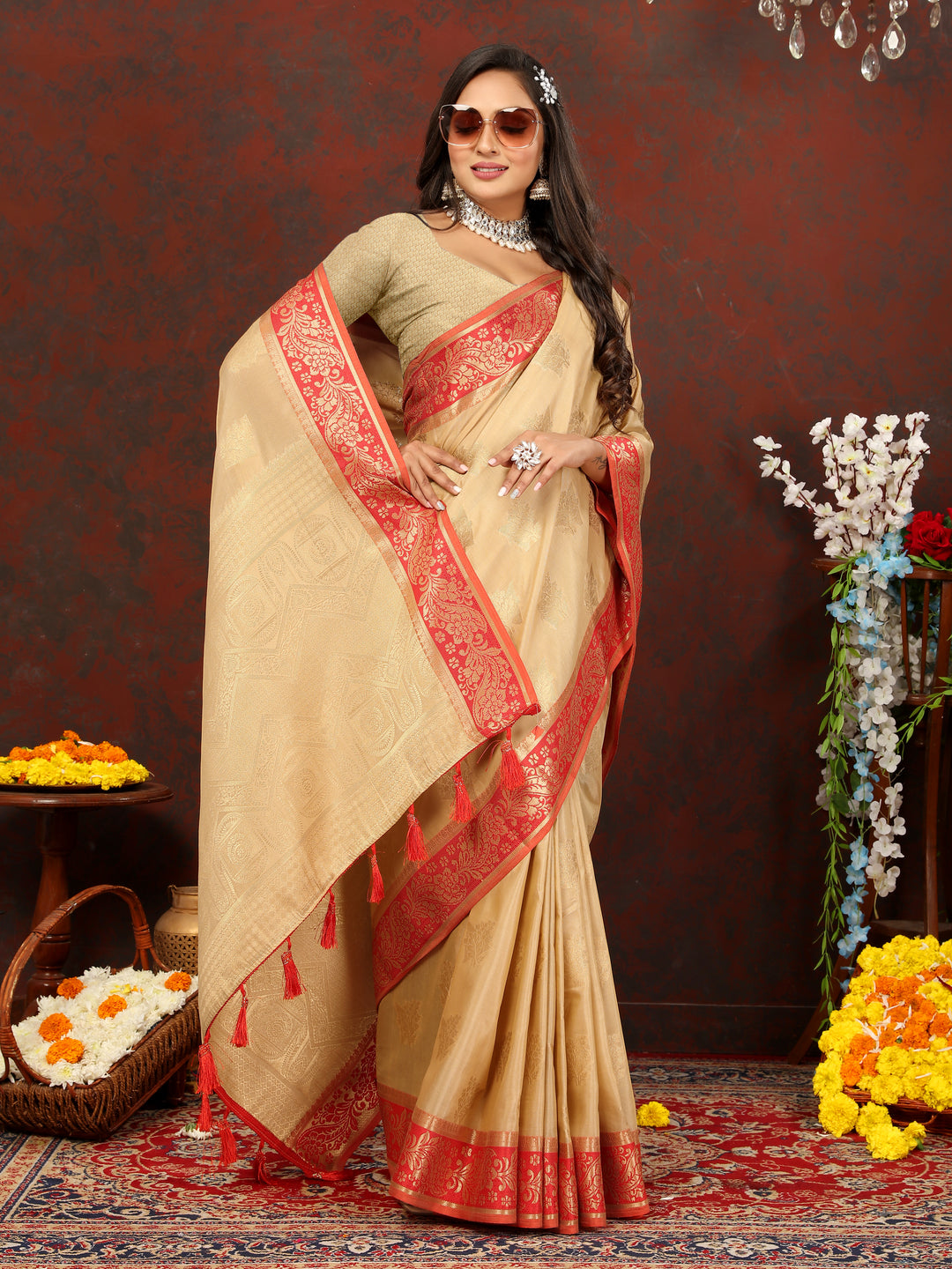 Classic beige cotton saree with rich zari pallu and silk blouse, perfect for weddings.