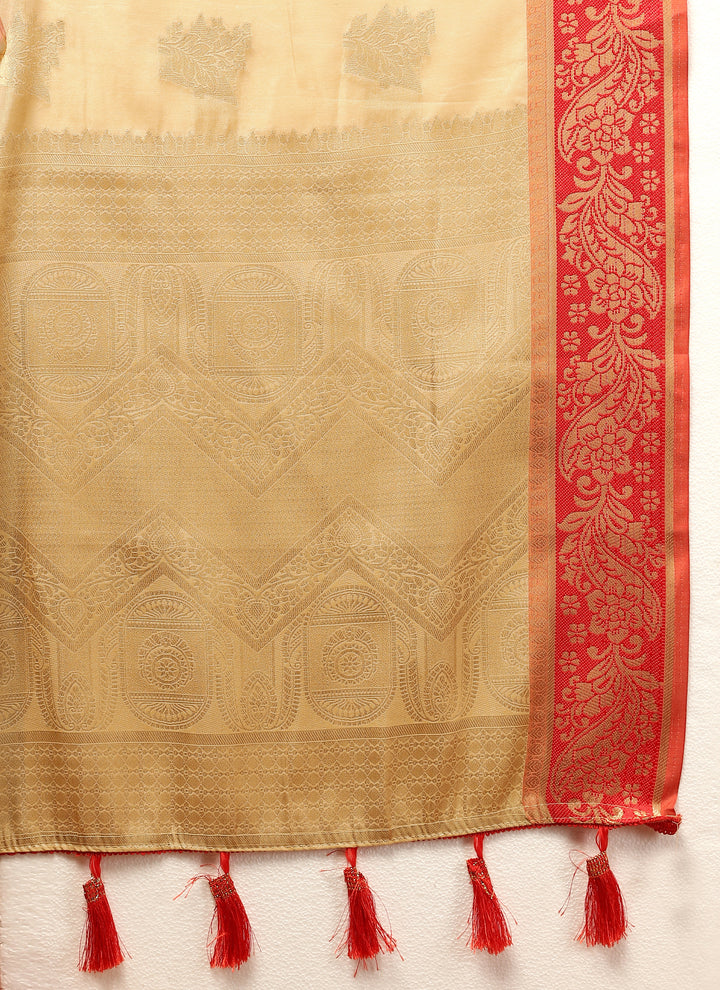 Beige cotton saree with exquisite zari pallu and silk blouse piece, perfect for grand celebrations.