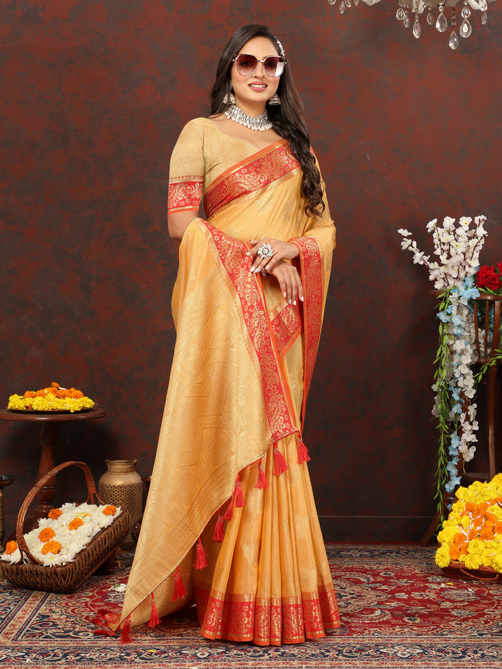 Designer mustard yellow cotton saree with zari pallu and silk blouse, ideal for formal gatherings.