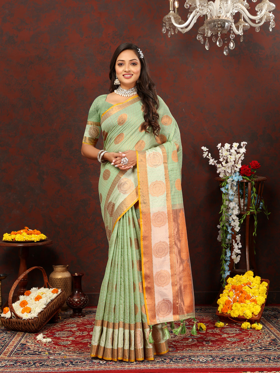 Green cotton saree with elegant zari woven details, perfect for festive occasions.