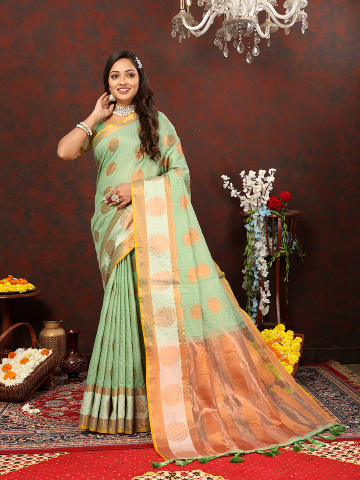 Timeless green cotton saree featuring intricate zari weaving, ideal for cultural events.