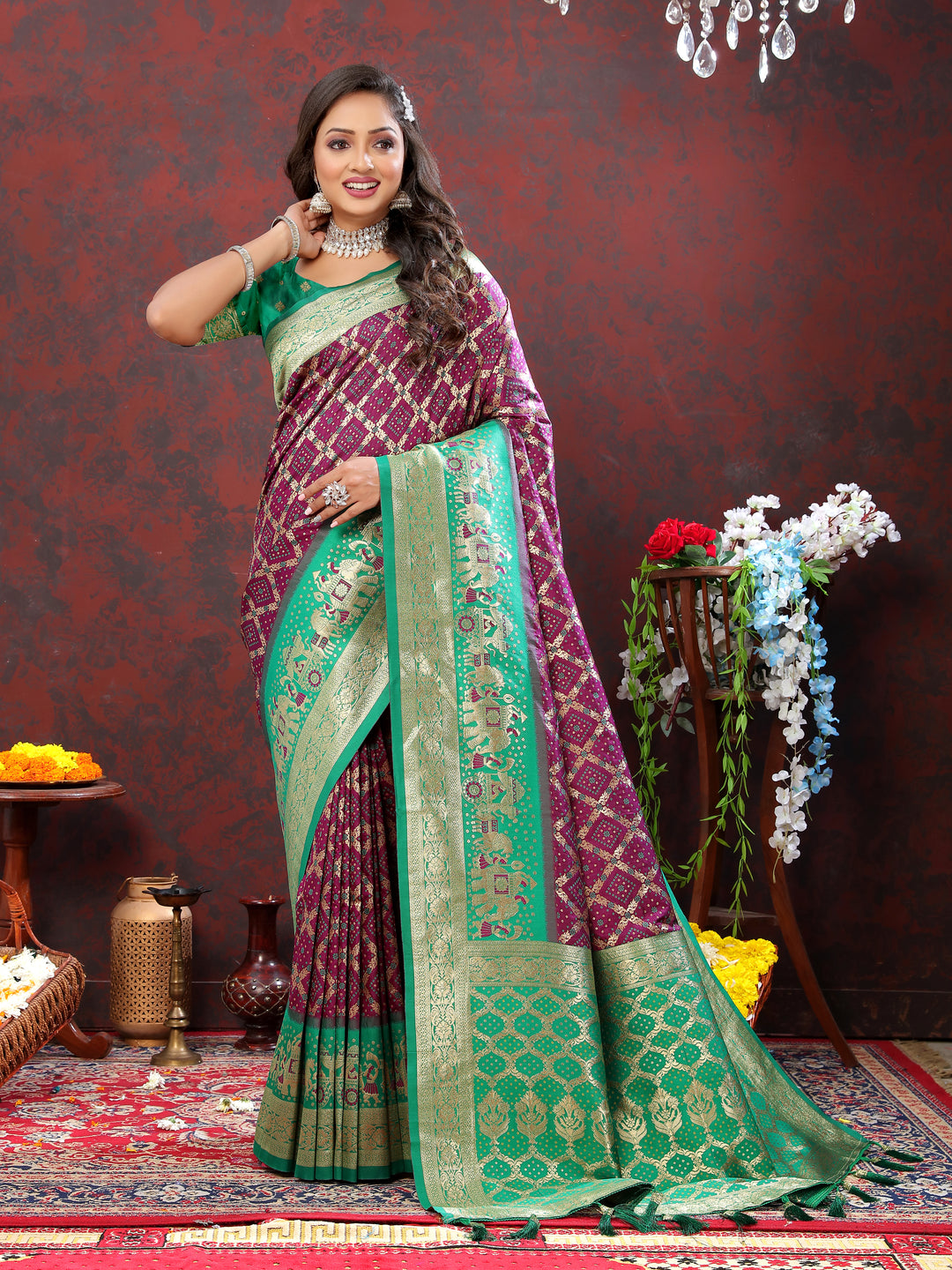 Elegant pink saree with Meenakari weaving and zari detailing, perfect for traditional events and gatherings.