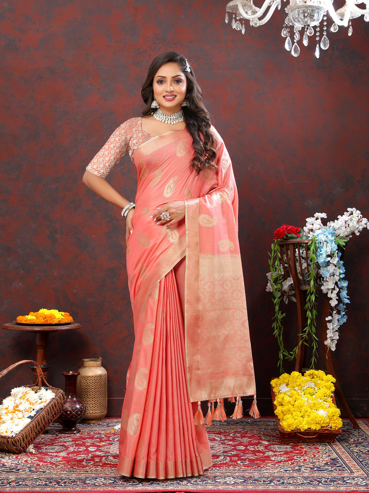 Elegant peach cotton saree with intricate zari weaving and tassels at the pallu, ideal for festive occasions.