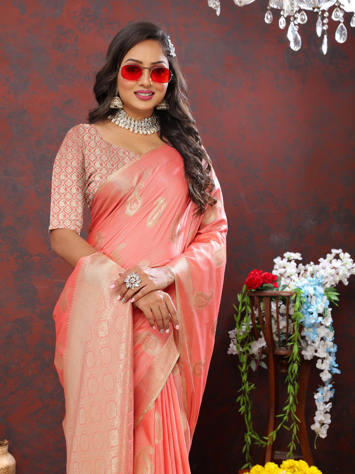 Timeless peach cotton saree with intricate zari detailing and tassels at the pallu, designed for special events.