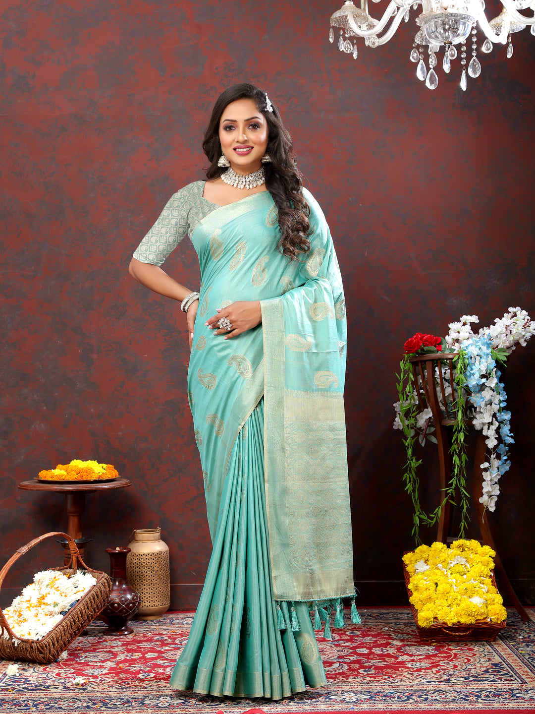 Beautiful pista green cotton saree with intricate zari weaving and tasseled pallu, perfect for festive gatherings.