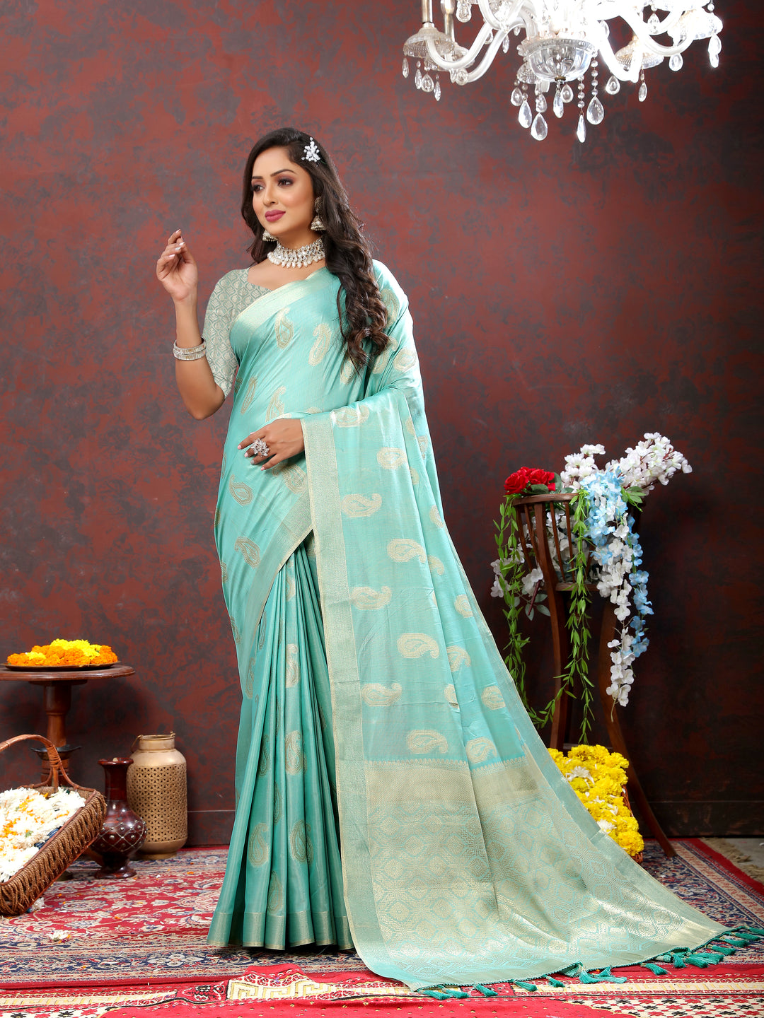 Elegant sky blue cotton saree with intricate zari weaving and tassels at the pallu, perfect for weddings.