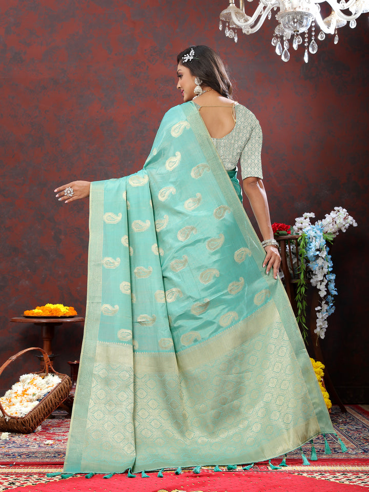 Timeless sky blue saree with intricate zari weaving and tassels at the pallu, perfect for special events.