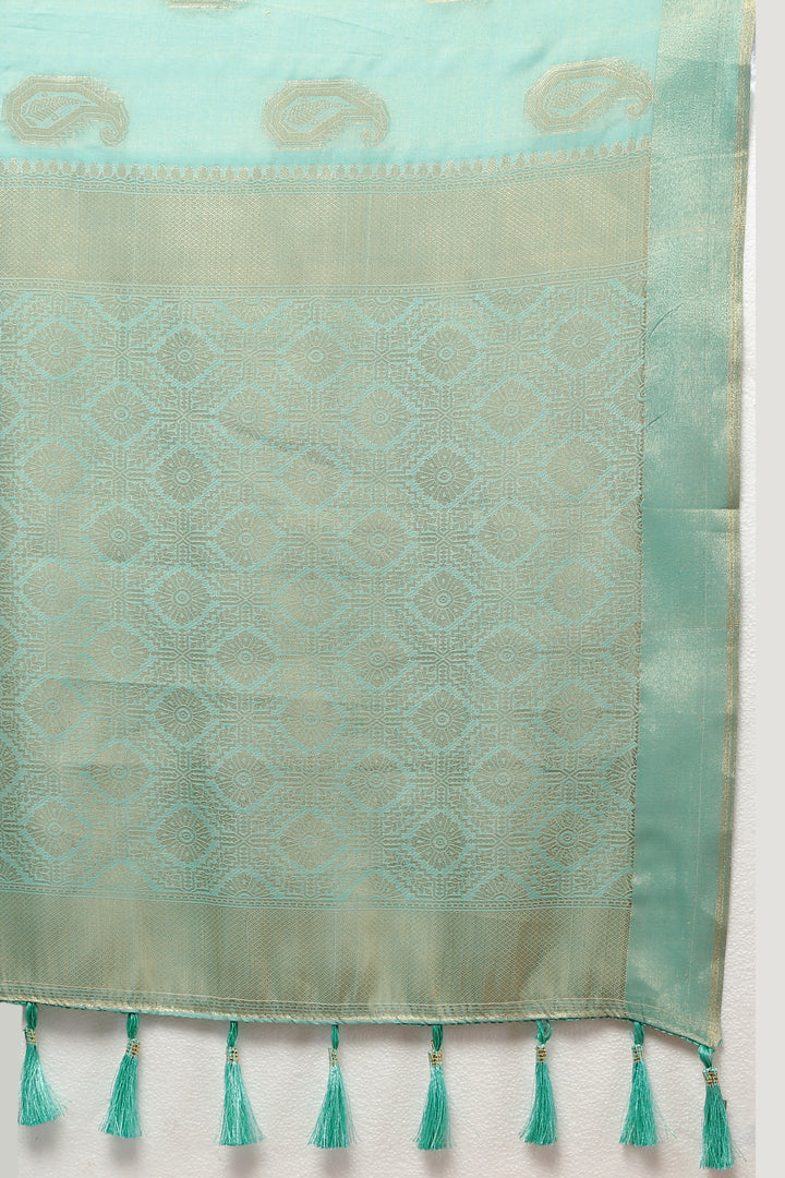 Stunning sky blue cotton saree with delicate zari work and tassels at the pallu, ideal for elegant gatherings.