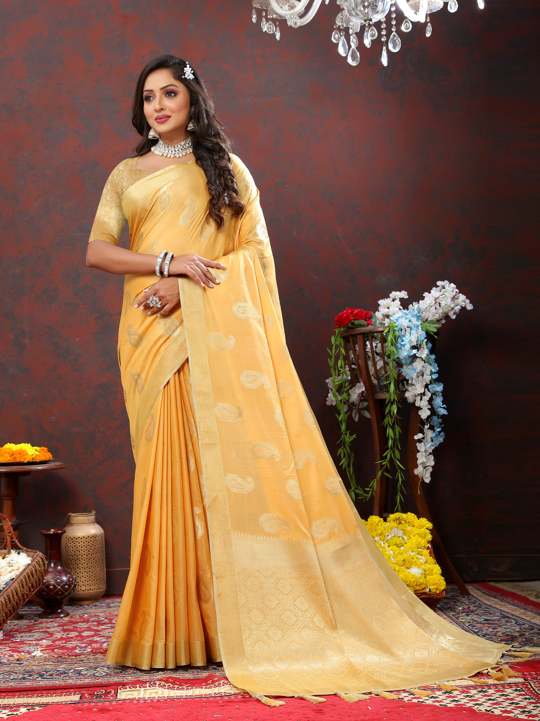 Bright yellow cotton saree with beautiful zari weaving and tassels at the pallu, ideal for weddings.