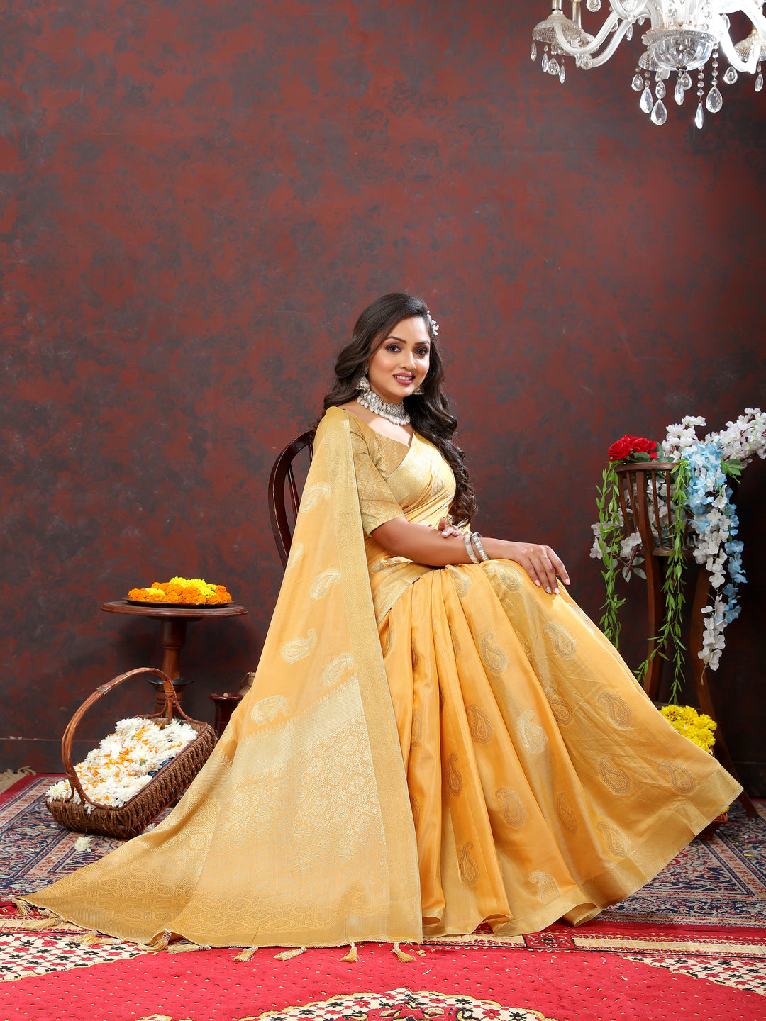 Elegant yellow saree with intricate zari work and tassels at the pallu, perfect for festive occasions.