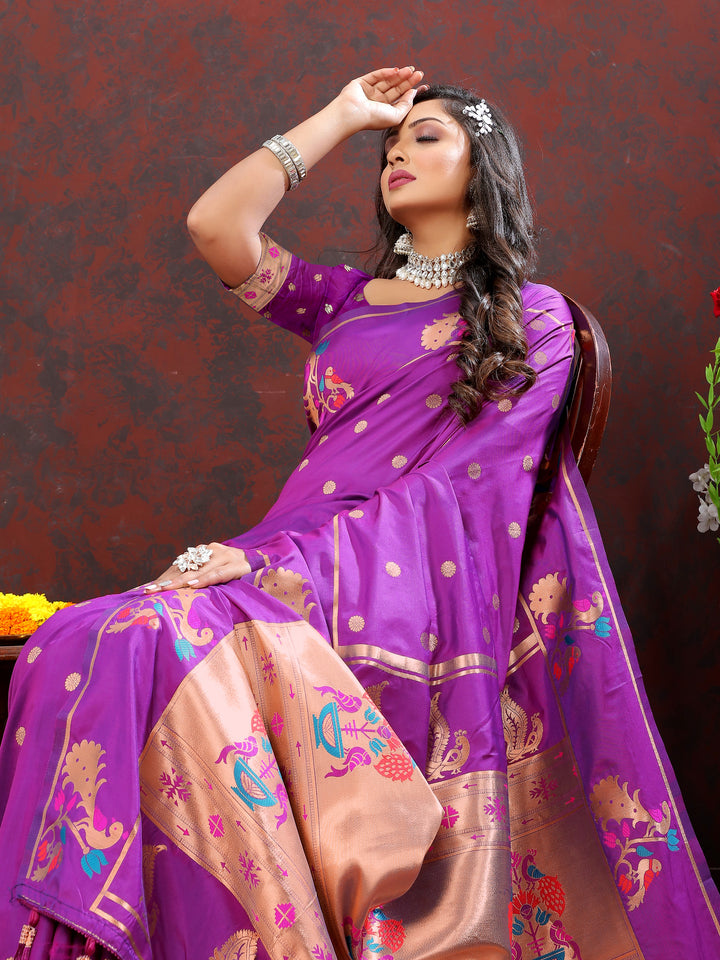 Designer purple Paithani silk saree with beautiful copper zari motifs and Meenakari border, perfect for traditional events.