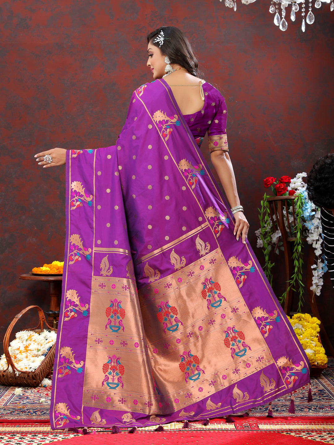 Traditional purple Paithani silk saree with exquisite copper zari motifs and Meenakari border for grand occasions.