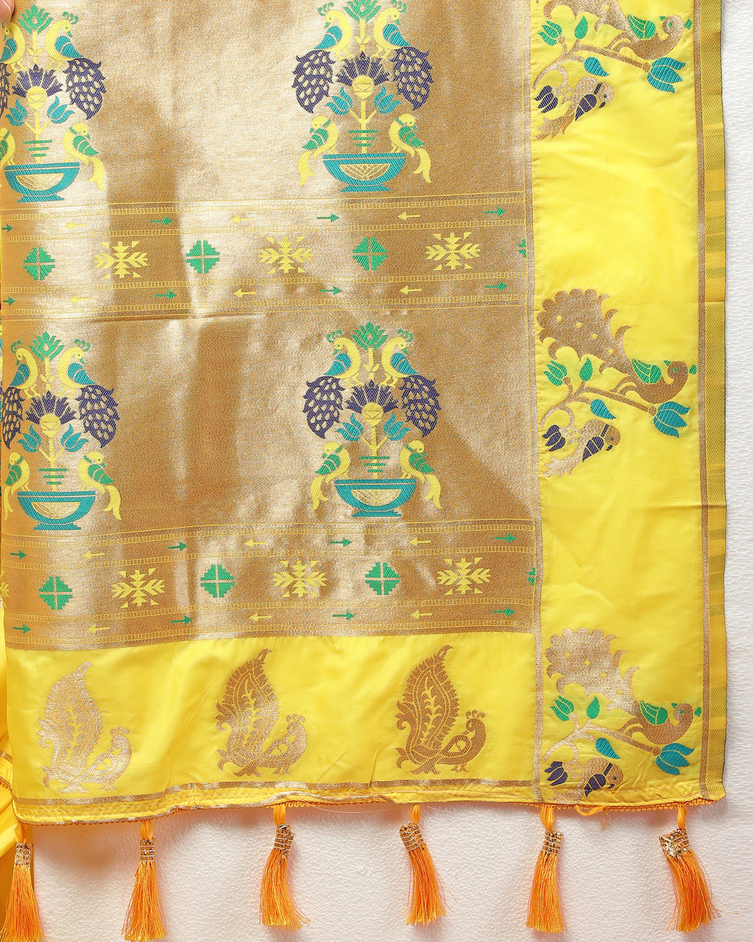 Timeless deep yellow Paithani silk saree featuring gold zari motifs and Meenakari border for weddings.