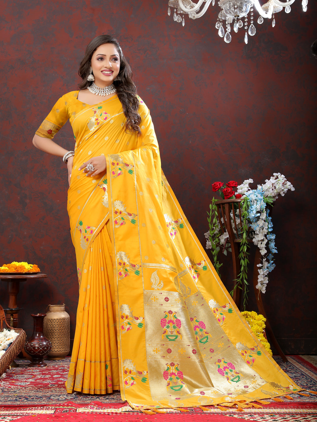 Navy Paithani silk saree with gold zari motifs and Meenakari border, ideal for weddings and special celebrations.