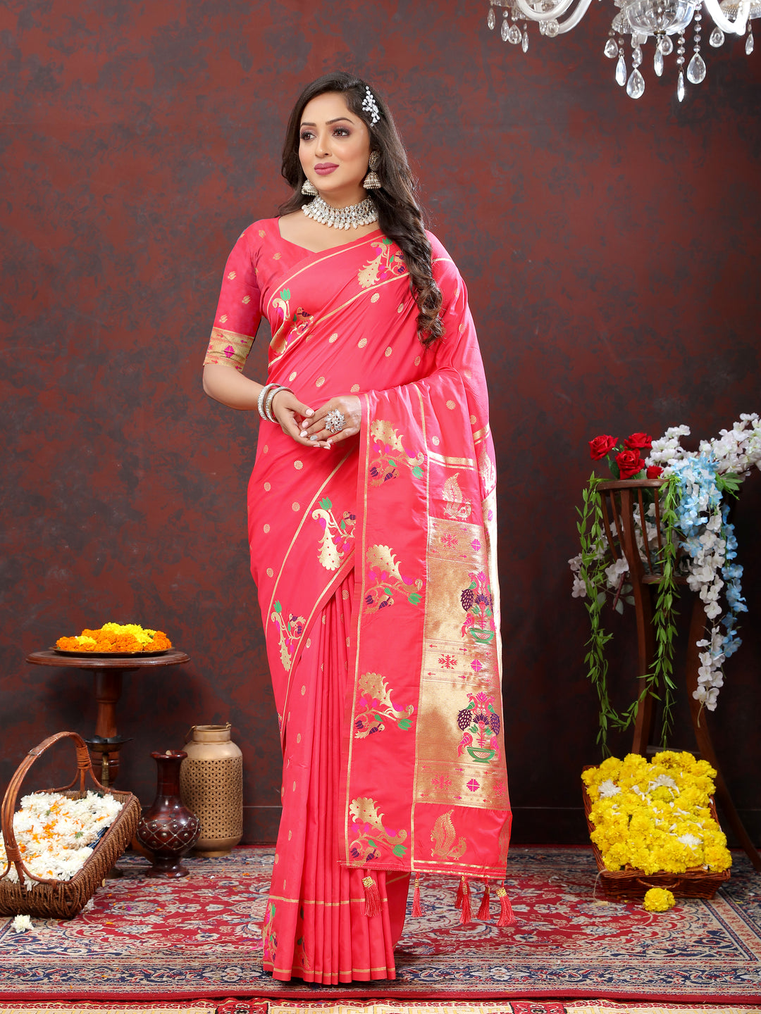 Elegant pink Paithani silk saree with gold zari detailing and Meenakari border for traditional occasions.