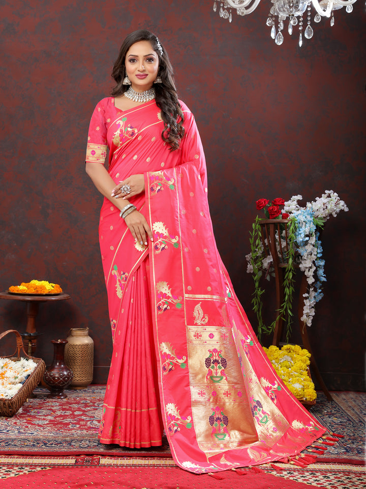 Timeless pink Paithani silk saree with intricate gold zari motifs and Meenakari border for grand events.