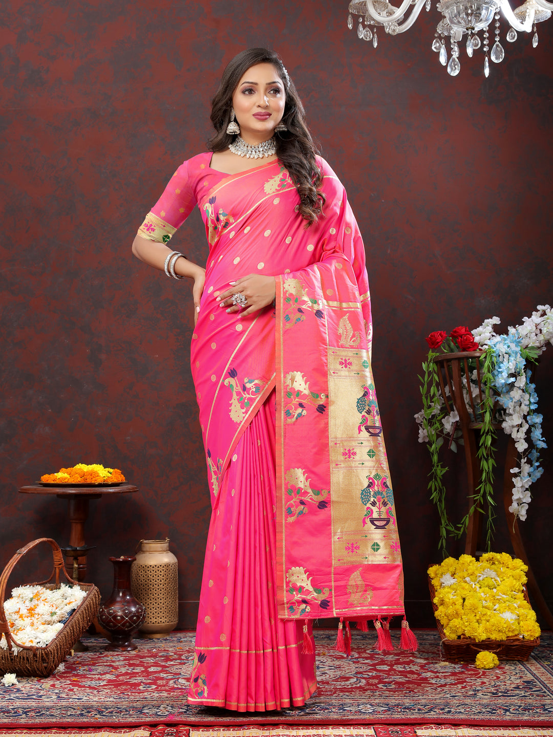 Elegant red Paithani silk saree featuring gold zari detailing and Meenakari border for cultural celebrations.