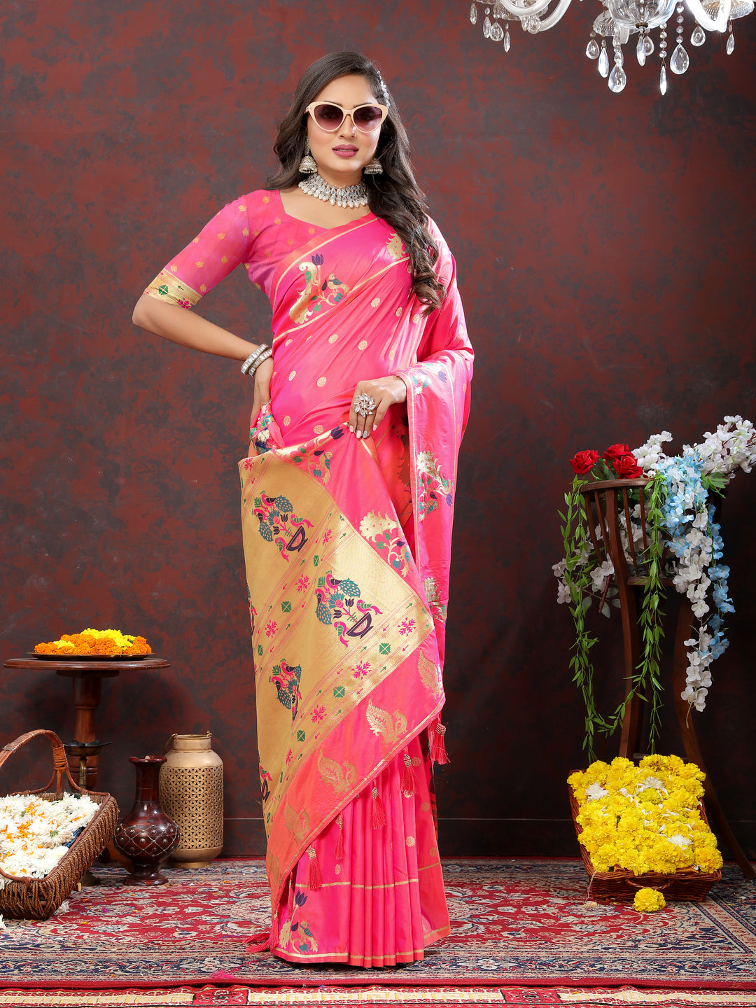 Timeless red Paithani silk saree with gold zari motifs and Meenakari border for grand occasions.