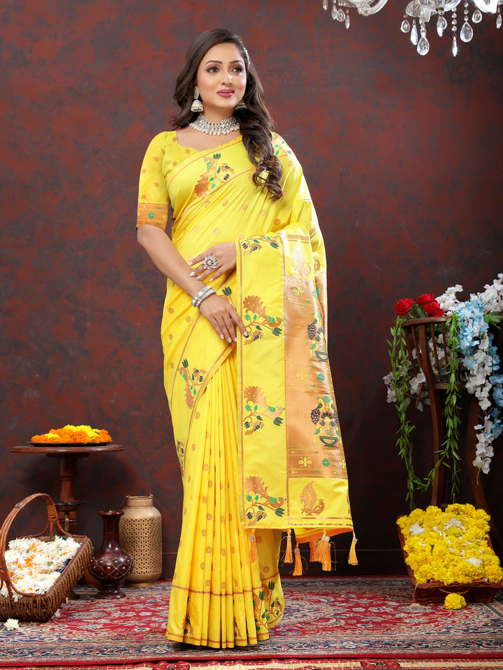 Timeless yellow Paithani silk saree with copper zari motifs and Meenakari border, perfect for cultural gatherings.