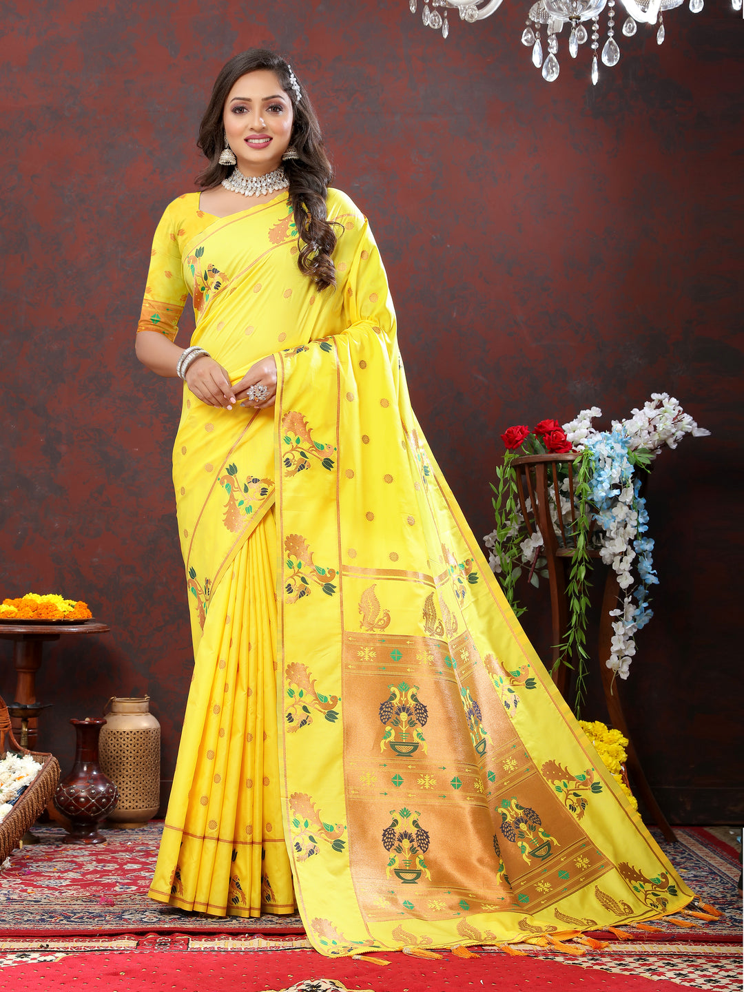 Traditional yellow Paithani silk saree with beautiful copper zari motifs and Meenakari border, perfect for weddings.