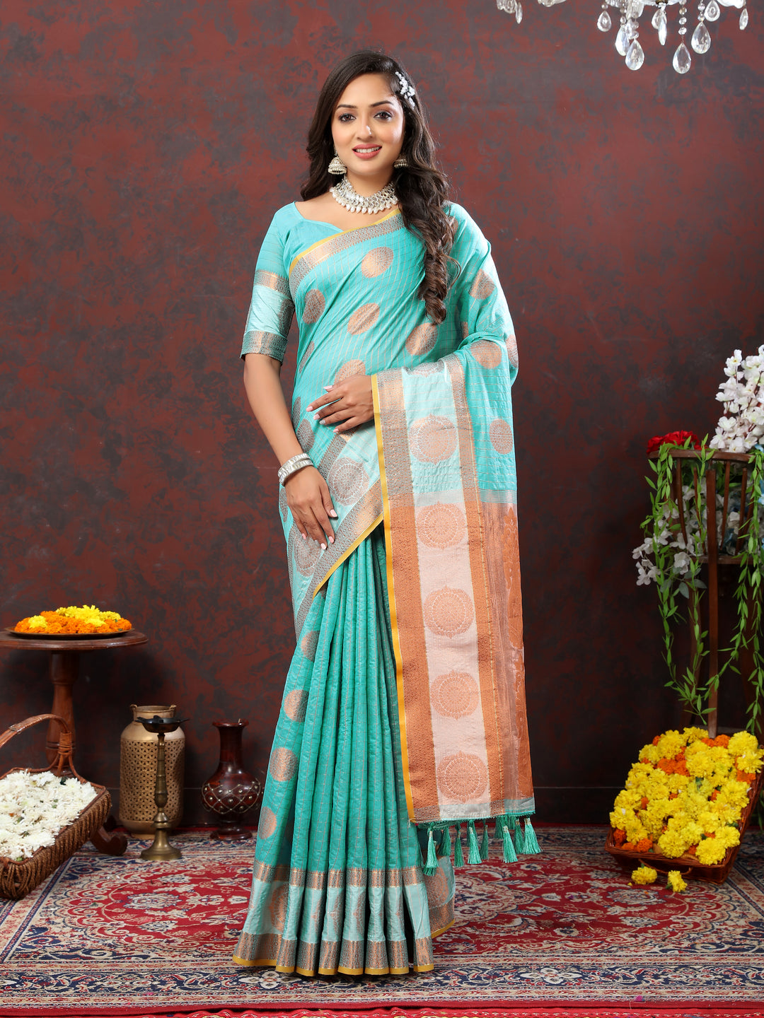 Stylish sky-blue cotton saree with detailed zari woven design, ideal for festive occasions.