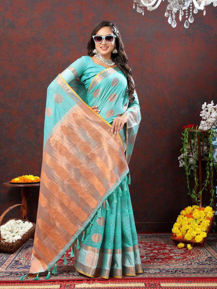 Elegant sky-blue cotton saree with beautiful zari woven details, ideal for grand celebrations.