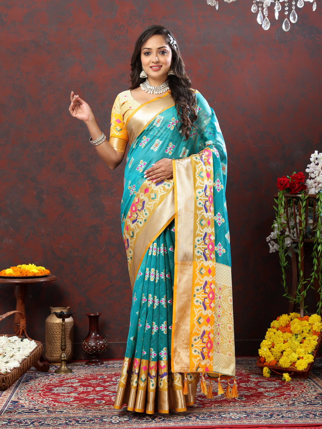 Sky blue organza silk saree with Meenakari weaving design, perfect for festive events.