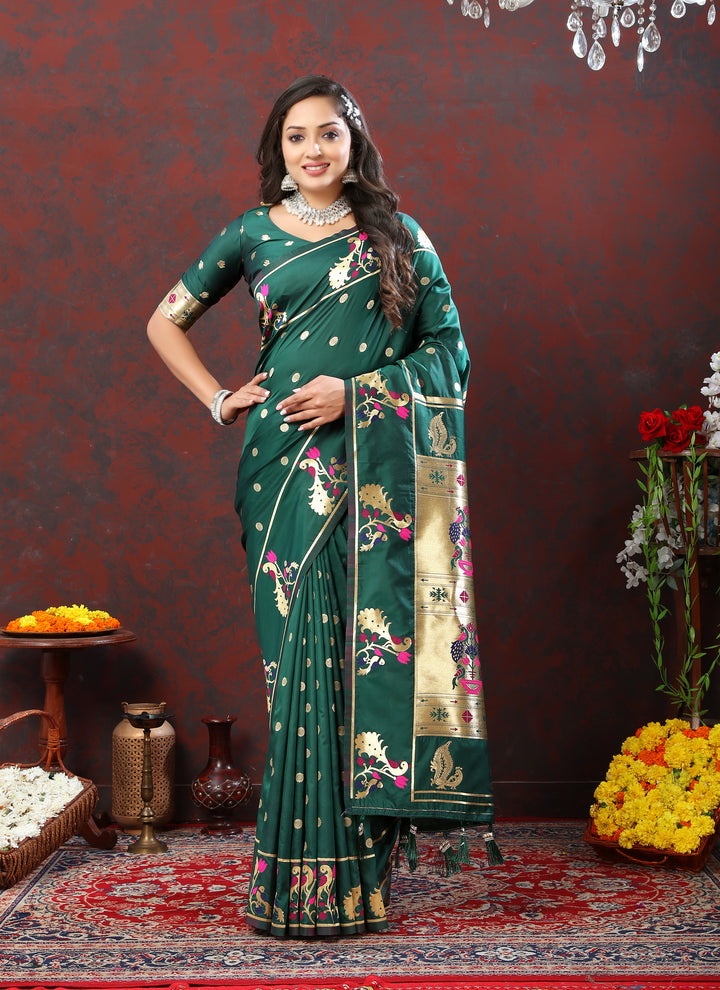 Designer dark blue Paithani silk saree with gold zari motifs and Meenakari border for grand celebrations.