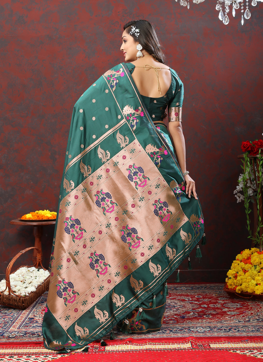 Dark purple Paithani silk saree with detailed copper zari motifs and Meenakari border, perfect for formal events.