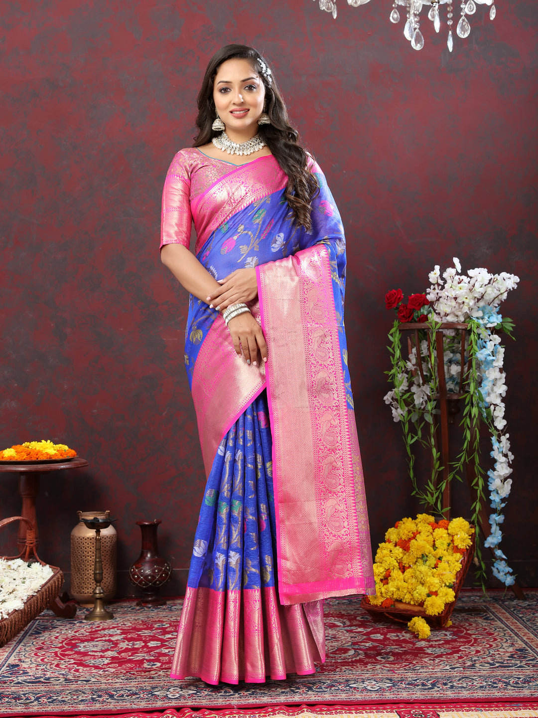 Blue cotton saree with Meenakari detailing and silk blouse, perfect for formal and grand events.