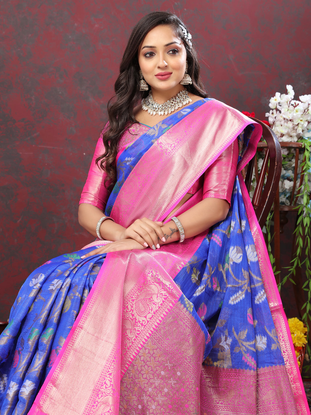 Elegant blue cotton saree with intricate Meenakari work and silk blouse, ideal for festive occasions.