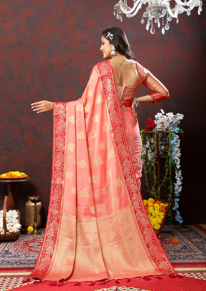 Sophisticated peach cotton saree with zari pallu and matching silk blouse, perfect for cultural occasions.