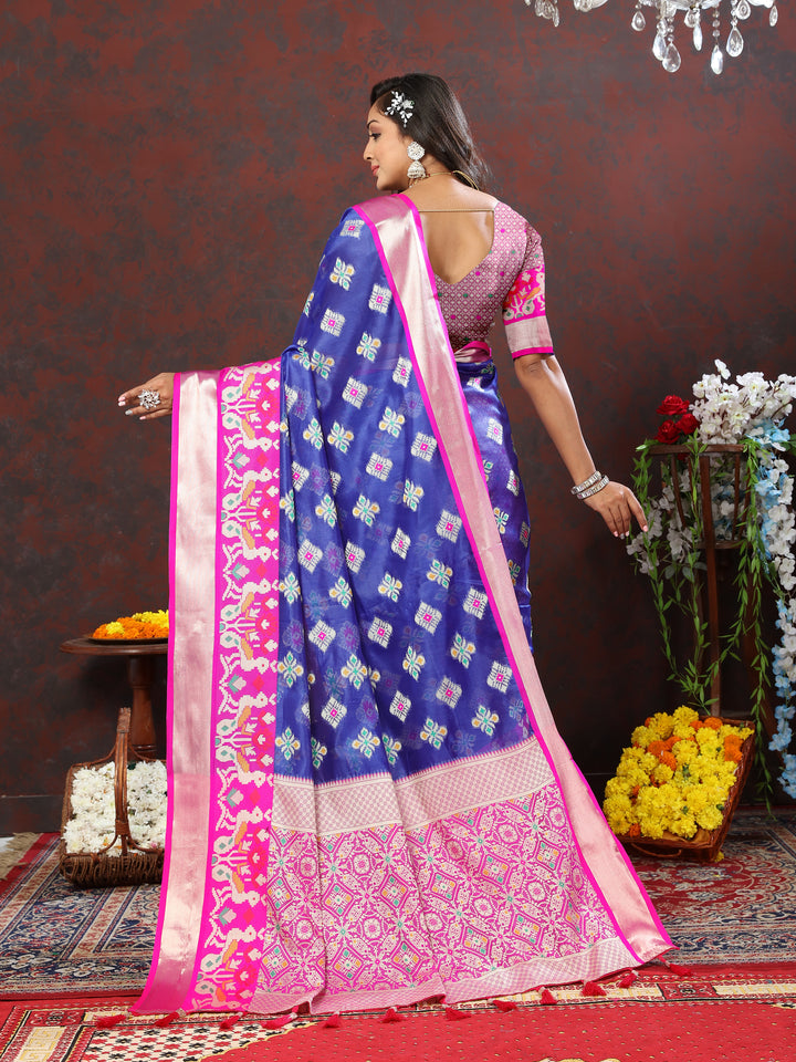 Blue saree with elegant zari and Meenakari work, ideal for bridal wear.