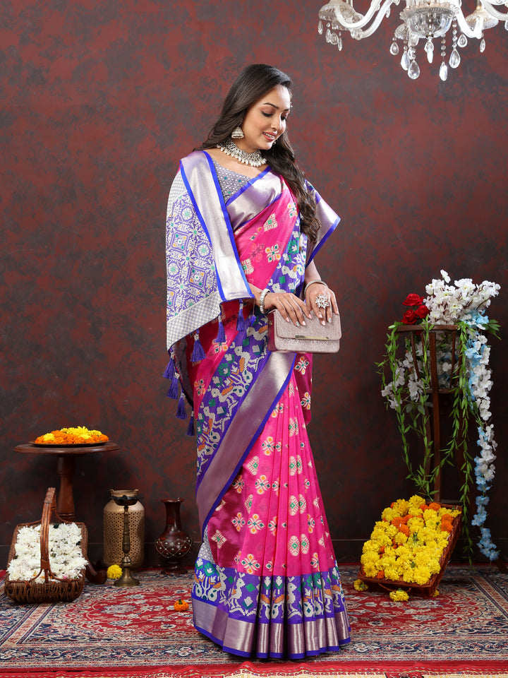 Pink silk saree featuring a beautiful zari woven pallu and elegant Meenakari motifs.