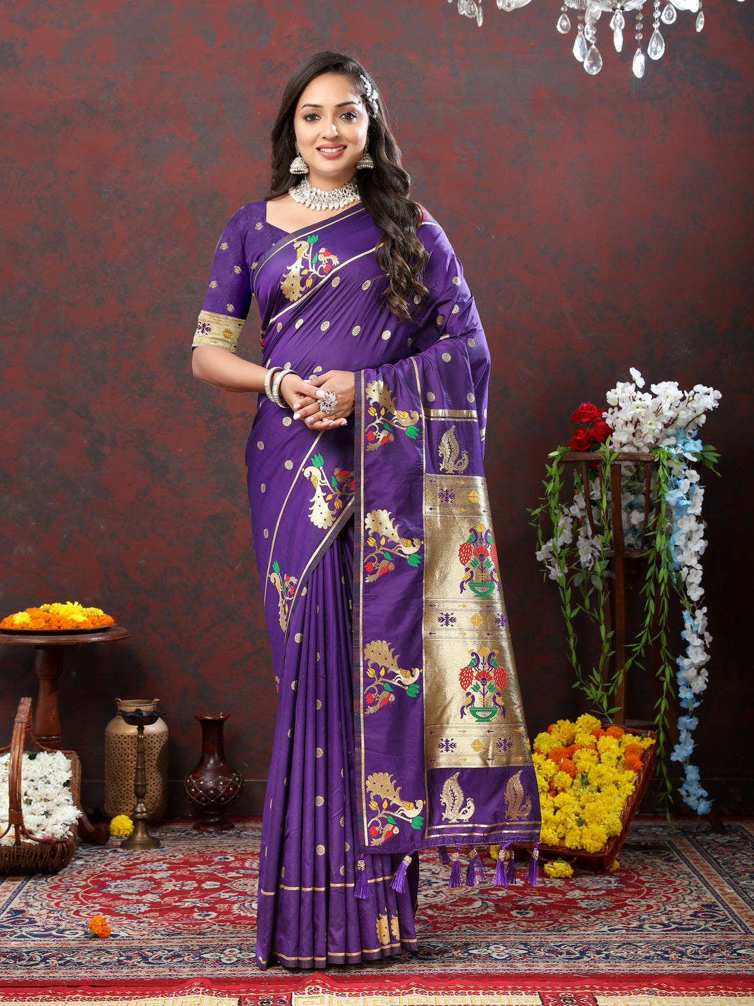 Purple Paithani silk saree with gold zari motifs and Meenakari border, perfect for traditional celebrations.