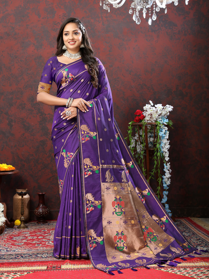 Timeless royal blue Paithani silk saree featuring copper zari motifs and Meenakari border for festive occasions.