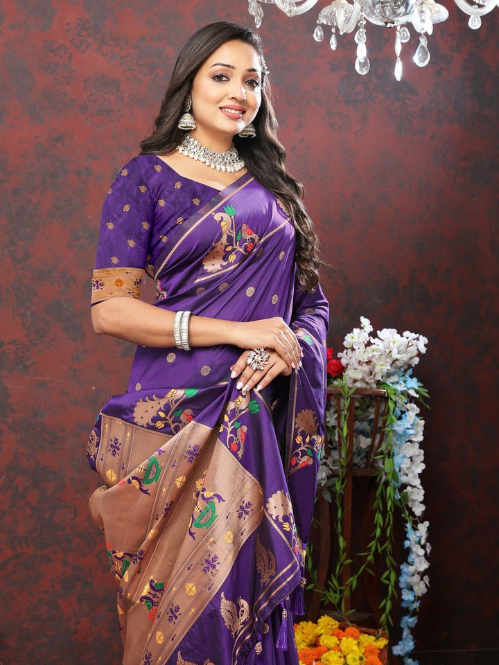 Blue Paithani silk saree with copper zari motifs and Meenakari border, perfect for cultural and traditional events.