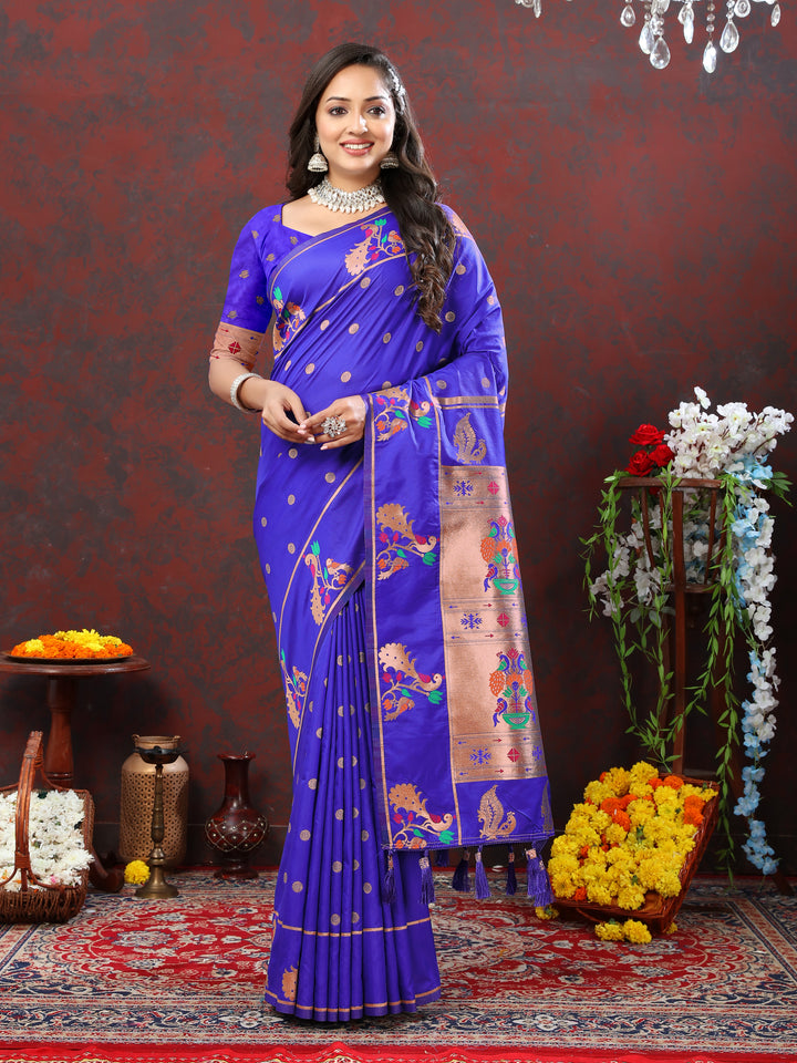 Timeless blue Paithani silk saree with copper zari motifs and Meenakari border, ideal for traditional celebrations.