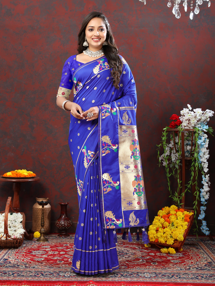 Dark purple Paithani silk saree with gold zari motifs and Meenakari border, perfect for grand occasions.