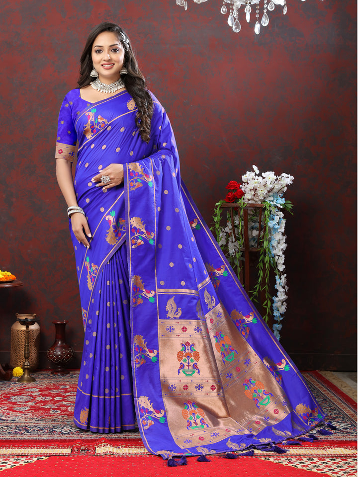 Traditional blue Paithani silk saree with detailed copper zari motifs and Meenakari border, perfect for weddings.