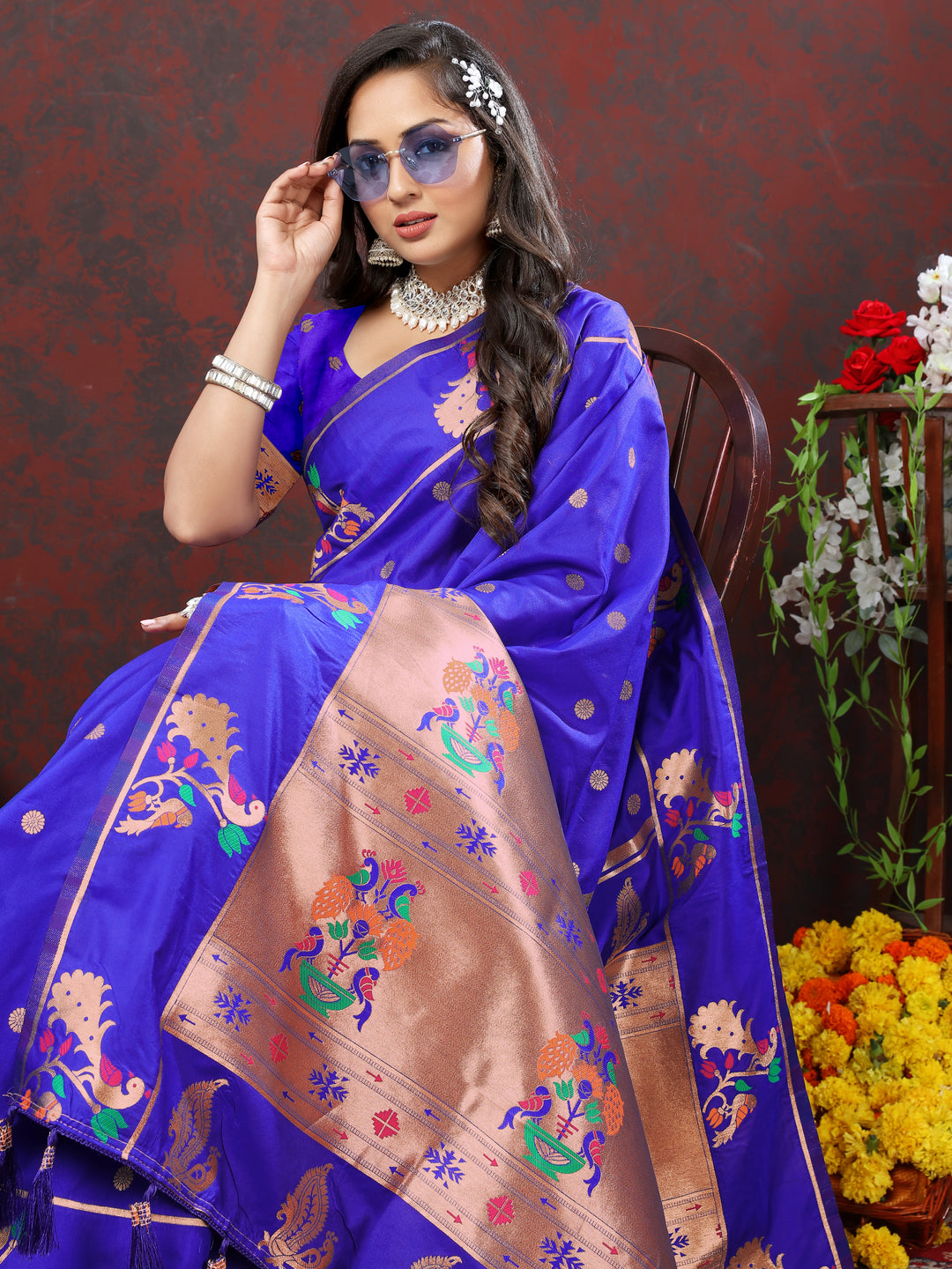 Classic blue Paithani silk saree with intricate copper zari work and Meenakari border, ideal for festive celebrations.