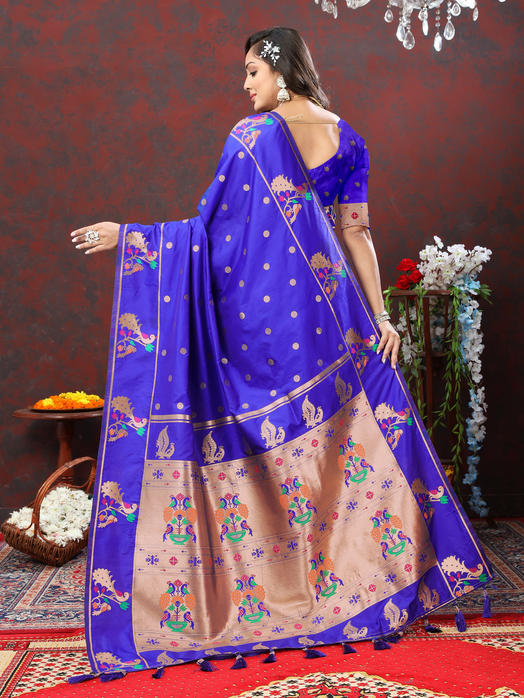 Timeless blue Paithani silk saree with copper zari motifs and Meenakari border, perfect for cultural festivals.