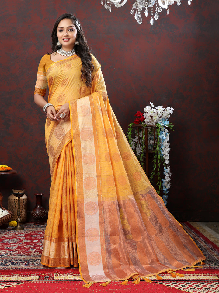 Designer yellow cotton saree with detailed zari woven patterns, ideal for festive gatherings.