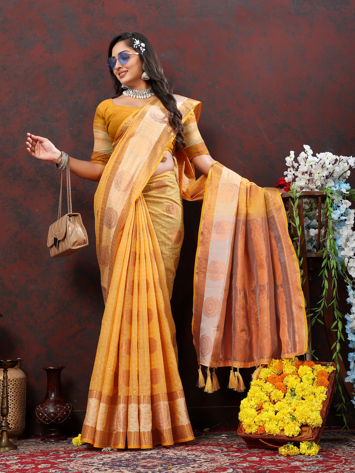 Timeless yellow cotton saree with stunning zari woven details, perfect for bridal celebrations.