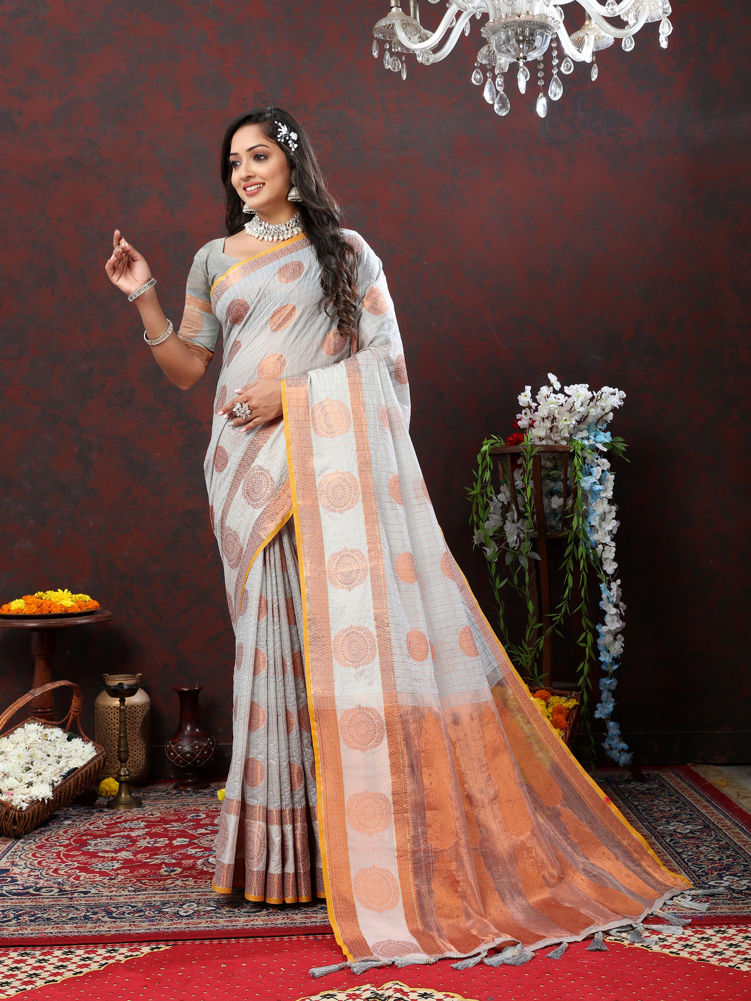 Timeless grey saree with zari weaving, ideal for cultural events and special gatherings.