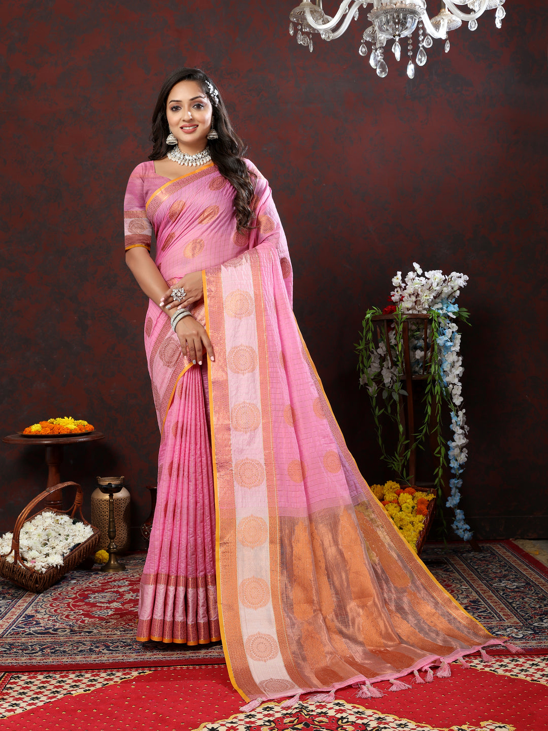 Pink cotton saree with beautiful zari work, perfect for weddings and special celebrations.