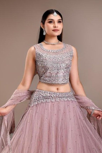 Stylish lavender floral crop top lehenga with intricate detailing in comfortable Jimmichu fabric, ideal for events.