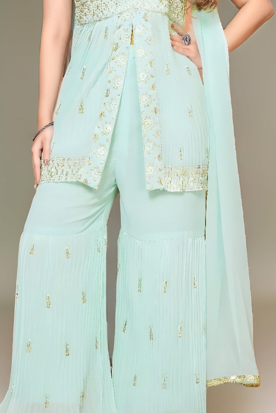 Stylish mint green kurti and dupatta garara suit, perfect for traditional wear.